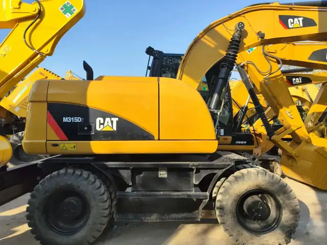 Экскаватор CAT, Душанбе
