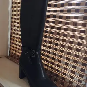 Женские сапоги, Худжанд