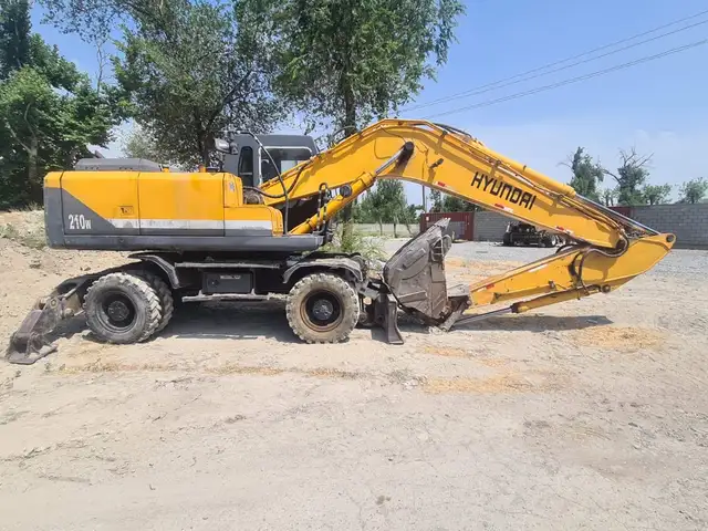 Экскаватор, Худжанд