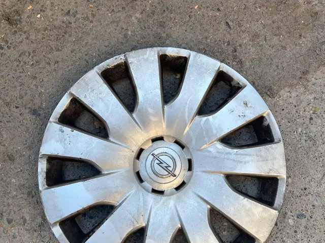 Колпак на Opel, Худжанд