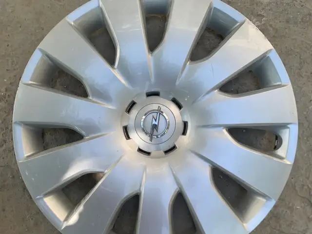 Колпак от Opel, Худжанд