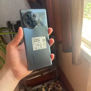 Телефон Tecno, Турсунзаде